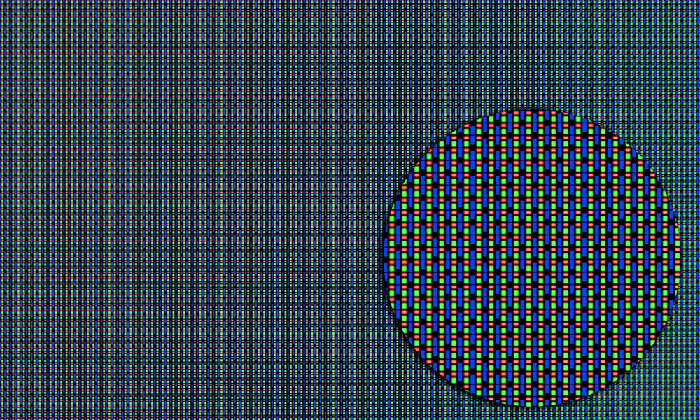 Closeup of OLED screen with red green and blue pixels and zoomed zone